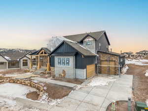 View of front of property featuring a garage