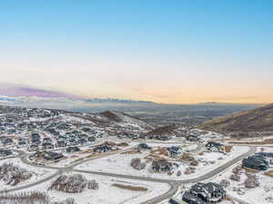 Snowy aerial view with a mountain view