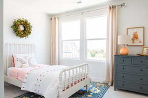 View of carpeted bedroom