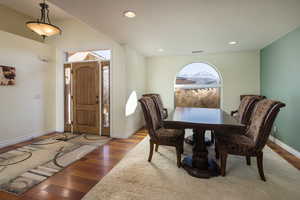 Dining space featuring dark hardwood / wood-style floors