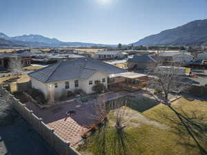 Birds eye view of property with a mountain view