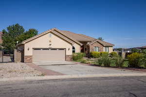 Ranch-style home featuring a garage