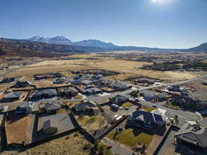 Birds eye view of property featuring a mountain view