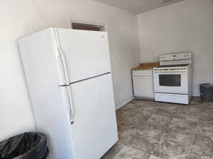 Kitchen with white appliances