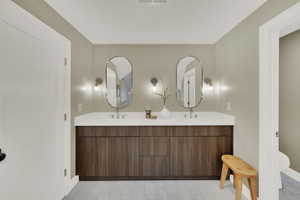 Bathroom with vanity and toilet