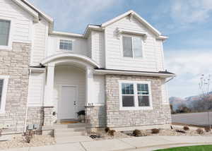 View of front of property with a mountain view