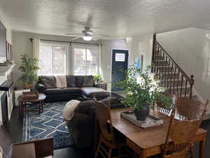 Living room featuring ceiling fan