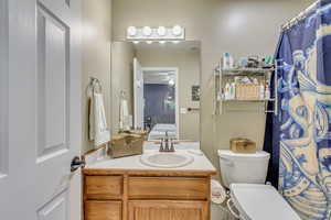 Bathroom with toilet and vanity