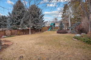 View of yard with a playground