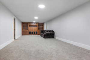 Unfurnished room with carpet floors