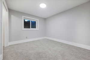 View of carpeted spare room