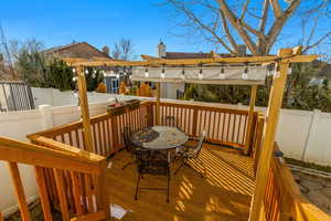 Wooden terrace with a pergola