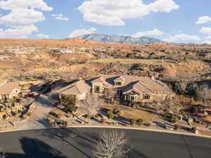 Birds eye view of property featuring a mountain view