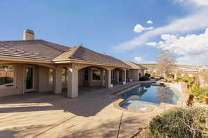 View of pool with a patio area