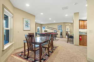 View of carpeted dining room