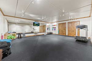 Workout room with track lighting