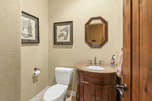 Bathroom with toilet and vanity