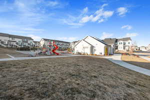 View of yard featuring a playground