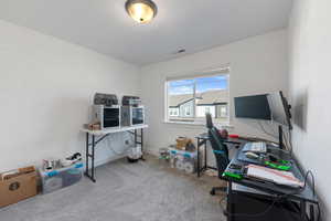 Office area featuring carpet flooring