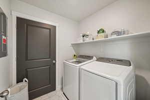 Full laundry room with access to the mechanical room