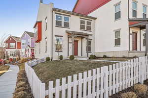 View of front of house featuring a front lawn