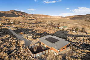 Drone / aerial view featuring a mountain view