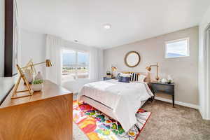 View of carpeted bedroom