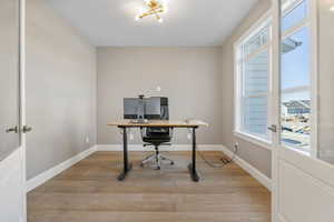 Office featuring light hardwood / wood-style floors