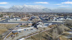 Birds eye view of property with a mountain view