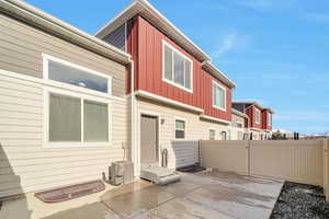 Back of property with a patio area