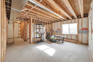 Miscellaneous room featuring concrete flooring