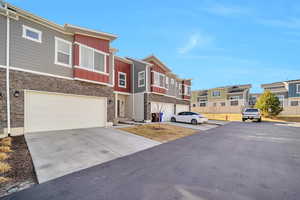 View of front of property with a garage