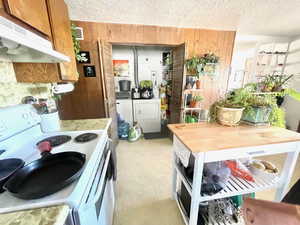 Unit 4 Laundry/Utility Room across from kitchen sink