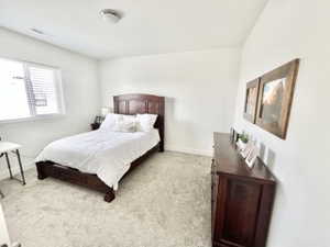 View of carpeted bedroom