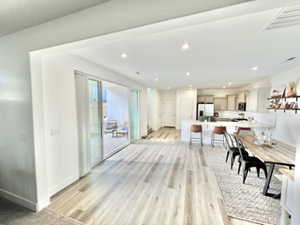 Dining space featuring light hardwood / wood-style floors