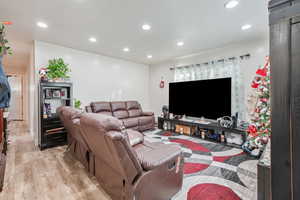 Living room featuring light hardwood / wood-style flooring