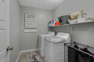 Clothes washing area with washer and dryer