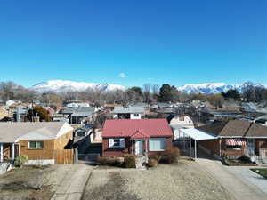 Birds eye view of property featuring a mountain view