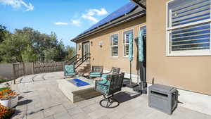 View of patio / terrace featuring a fire pit