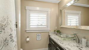 Bathroom featuring vanity