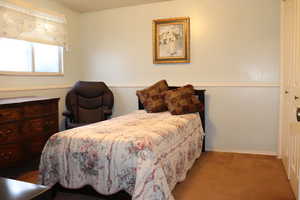 View of carpeted bedroom