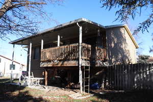 Rear view of property featuring a patio area