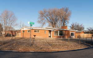 View of ranch-style house, corner lot