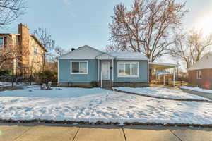 View of front of home with a carport