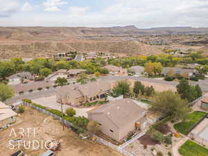 Birds eye view of property with a mountain view