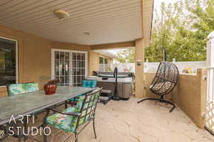 View of patio / terrace featuring a hot tub