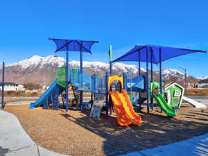 View of play area featuring a mountain view