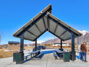 Surrounding community featuring a mountain view and a gazebo