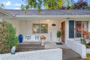 Property entrance featuring a porch