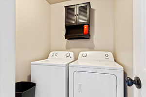 Laundry area featuring washing machine and dryer